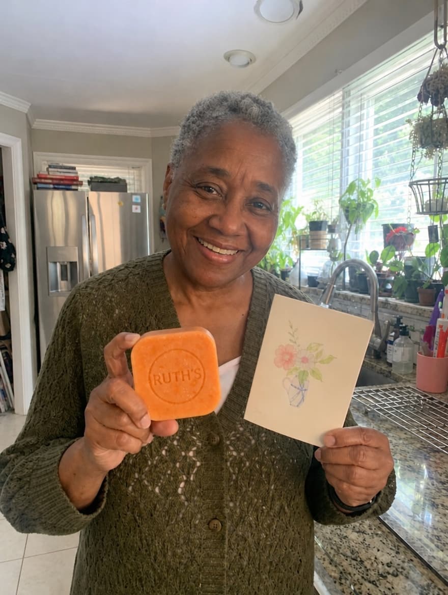 Denise holding the soap bar
